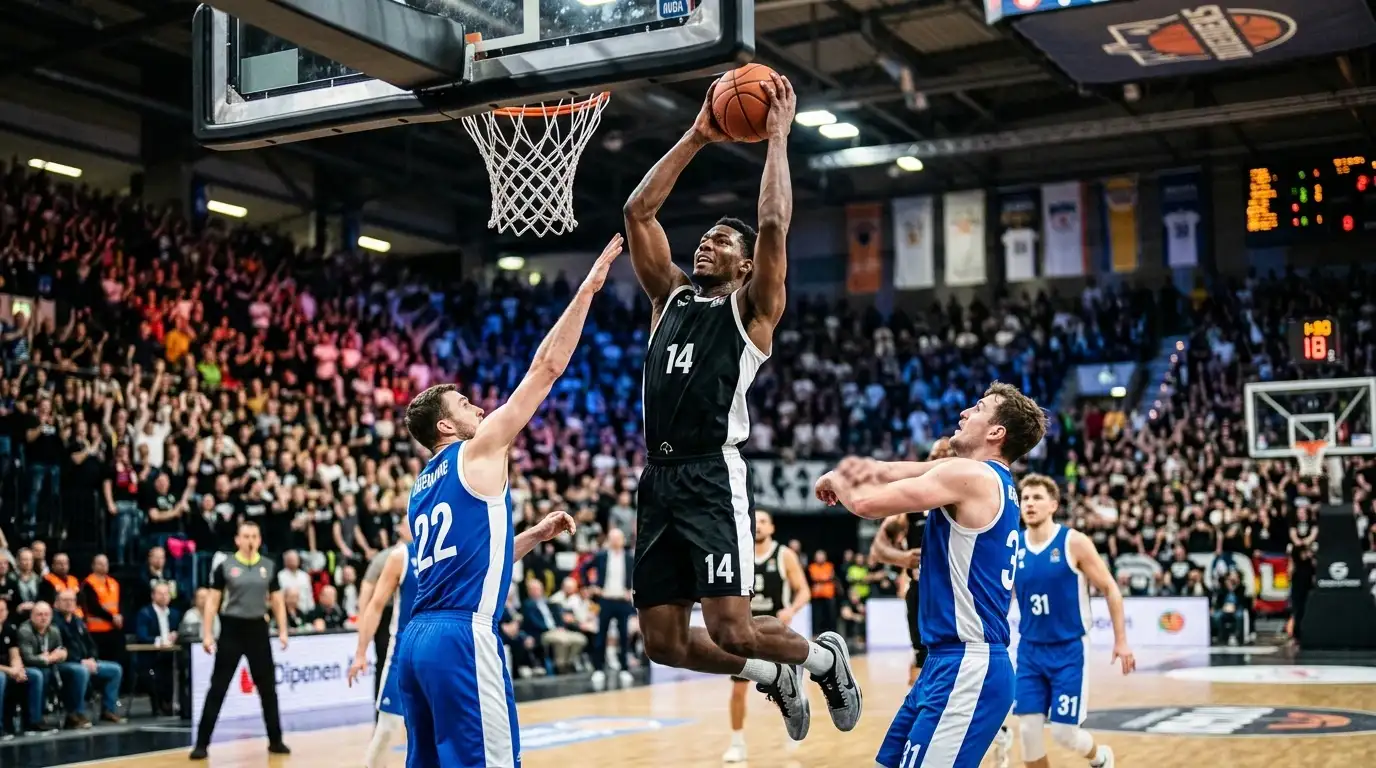 Jugador de baloncesto profesional capturando un rebote en el partido